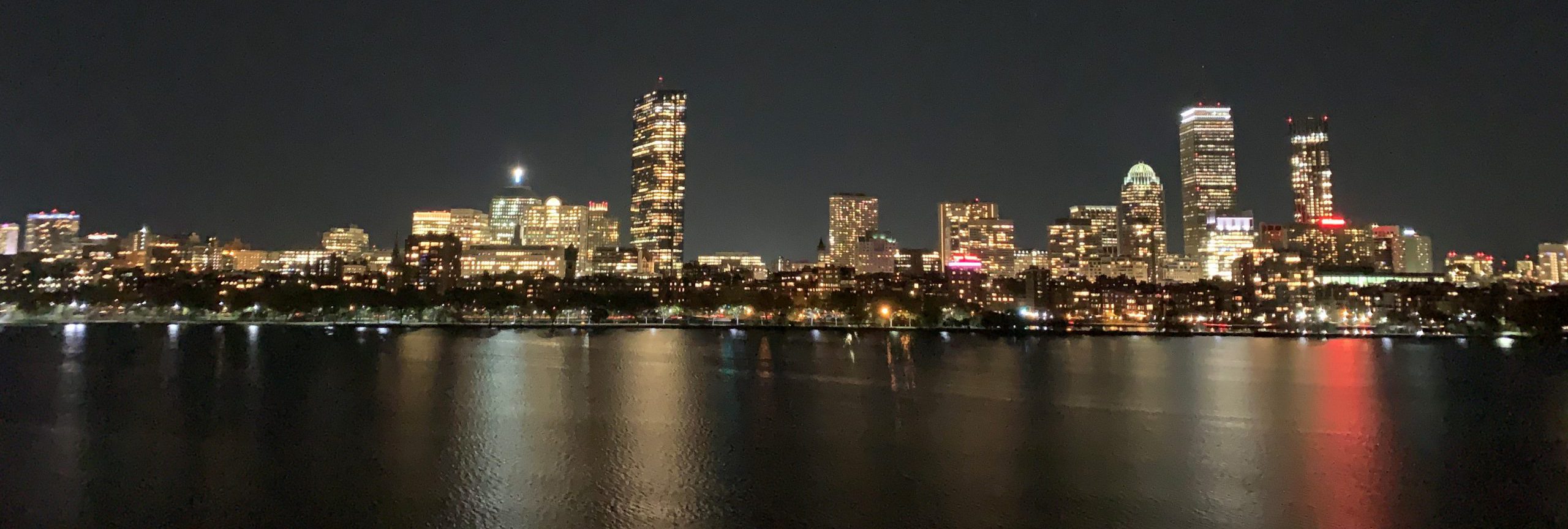 Boston by night, city panorama across the Charles River